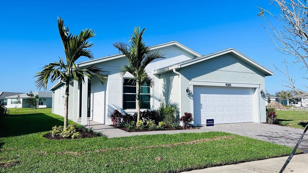 Photo of 11260 SW Lyra Drive, Port Saint Lucie, FL 34987 (MLS # R10783354)