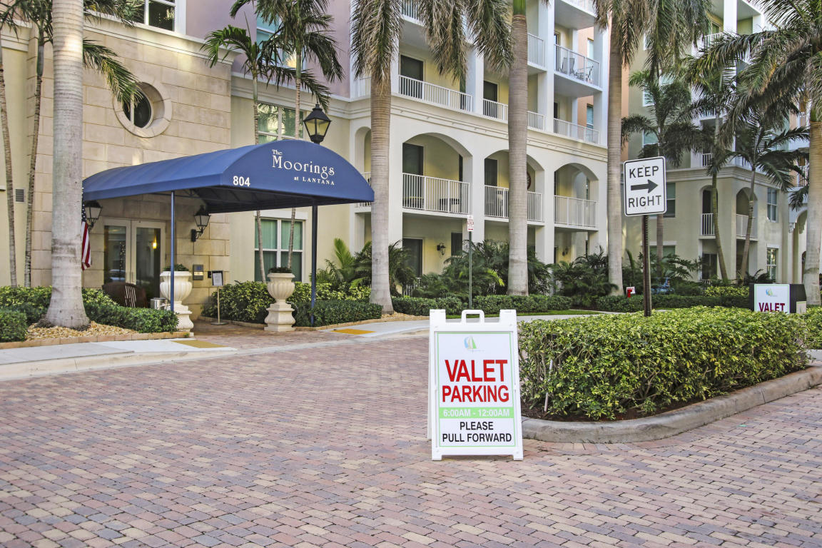Come and see this immaculate 2 bedroom condo in this beautiful well kept waterfront community! This condo features beautiful tile and laminate throughout, granite counters in kitchen, walk in closets in each bedroom and much more! The Moorings of Lantana is a waterfront community with full marina (Loggerhead Marina). Community features, onsite management, 2 pools, 2 hot tubs, state of the art gym, his and hers saunas, conference room, billiard room, library, club room with kitchen (for events), valet from 6am-12am 24 hour security and more!