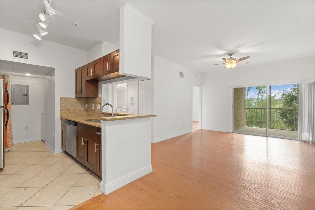 Photo of 11661 W Atlantic Boulevard #34, Coral Springs, FL 33071 (MLS # F10525690)