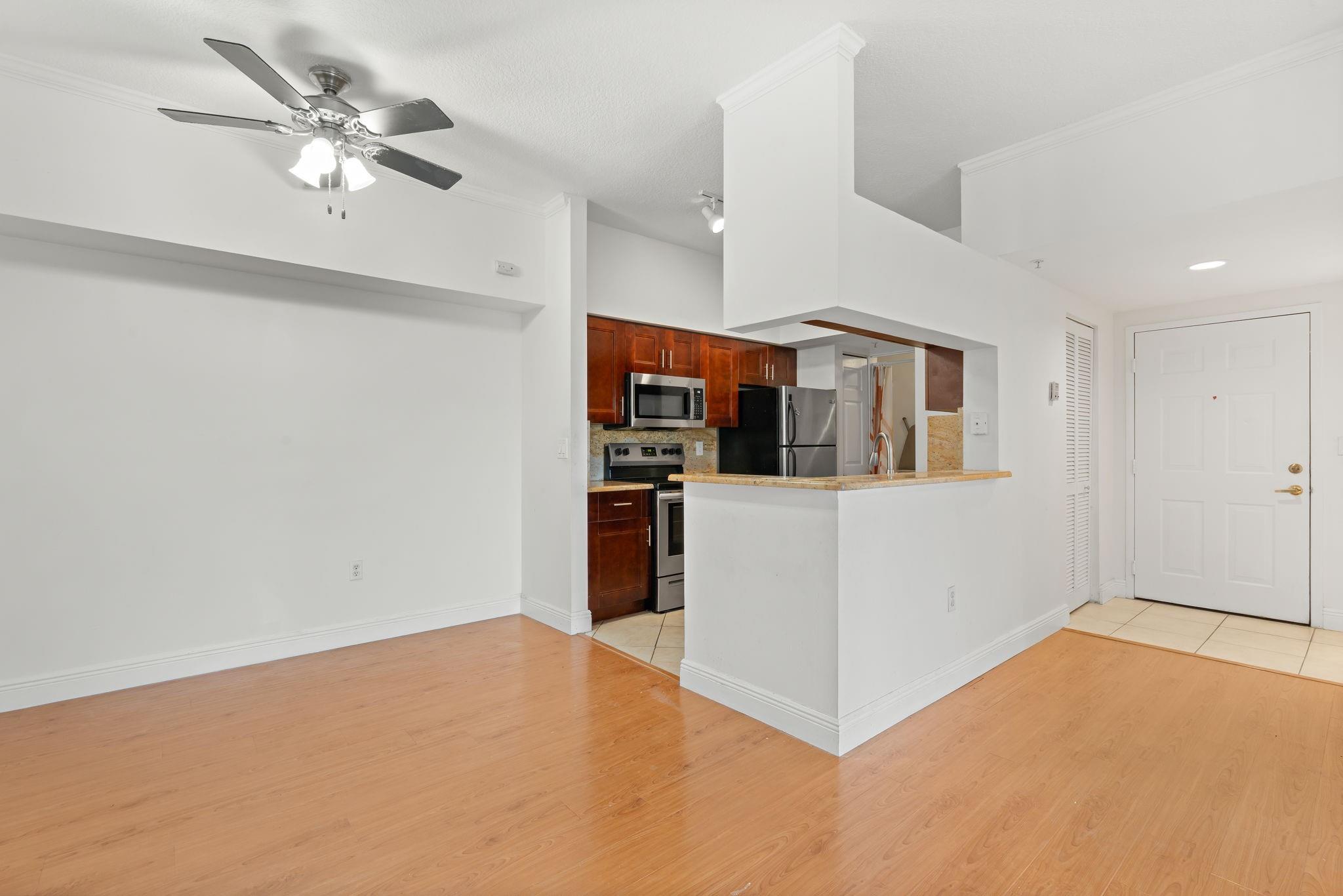 Spacious 2 bedroom 2 bathroom rental in gated Palms Point of Coral Springs. Relax on your spacious balcony and enjoy the calming lake views. Great location to highways, shopping, and dining. Well cared for unit with quartz countertops in the kitchen, and wood laminate flooring throughout. Washer and Dryer in unit. Enjoy the resort style amenities including pool, spa, fitness center, tennis, and playground.