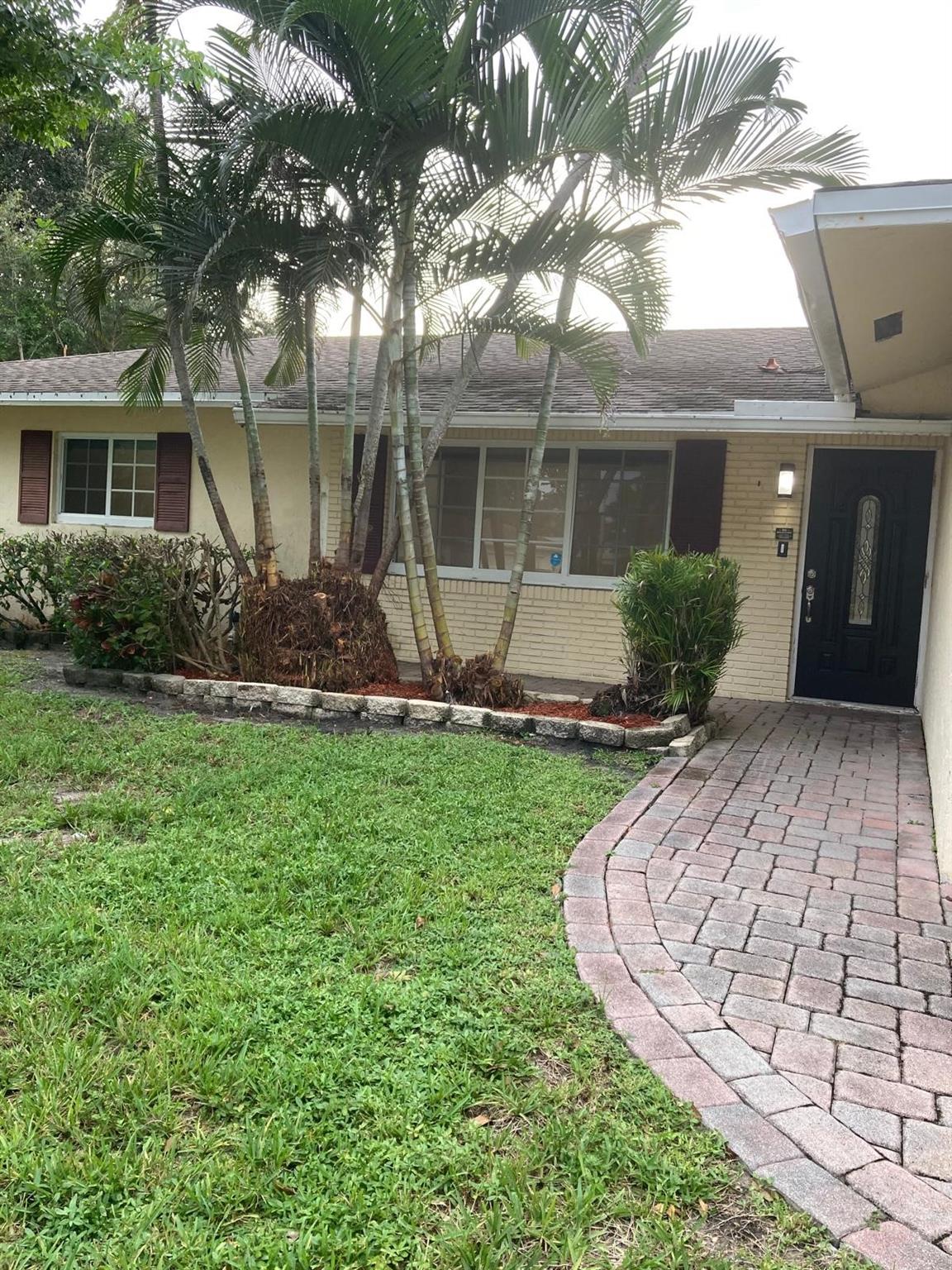 ANNUAL UNFURNISHED RENTAL - Must see this spacious (2,048 sq ft), 4-bedrooms + 2-bathrooms with 2-car garage located on a cul de sac in desirable Palm Aire Village. Amenities include brand new stainless steel appliances, new hot water heater, AC unit, heated pool, hurricane impact windows, patio and large backyard. There is a tiki hut in the backyard with a refrigerator- This is a great home in a great neighborhood