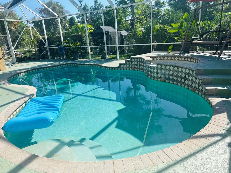 HOME SWEET HOME*Absolutely Amazing Floor Plan*Interior of home just freshly painted*Home features Lg Living Room & Family Room*Master Bedroom Downstairs plus 3 Additional Bedrooms & 3 Bathrooms downstairs* Upstairs has 600 SQ. FT with 1 bedroom & bathroom, large living area plus a loft with a closet*Home also has a Spectacular Screened In Saltwater Pool Area*Theres a whole house Water Filtration System*Newer Air Conditioner*Updated Appliances* Speaker System Throughout*Water Heater & Stove are Gas*No Backyard Neighbors Its Private*