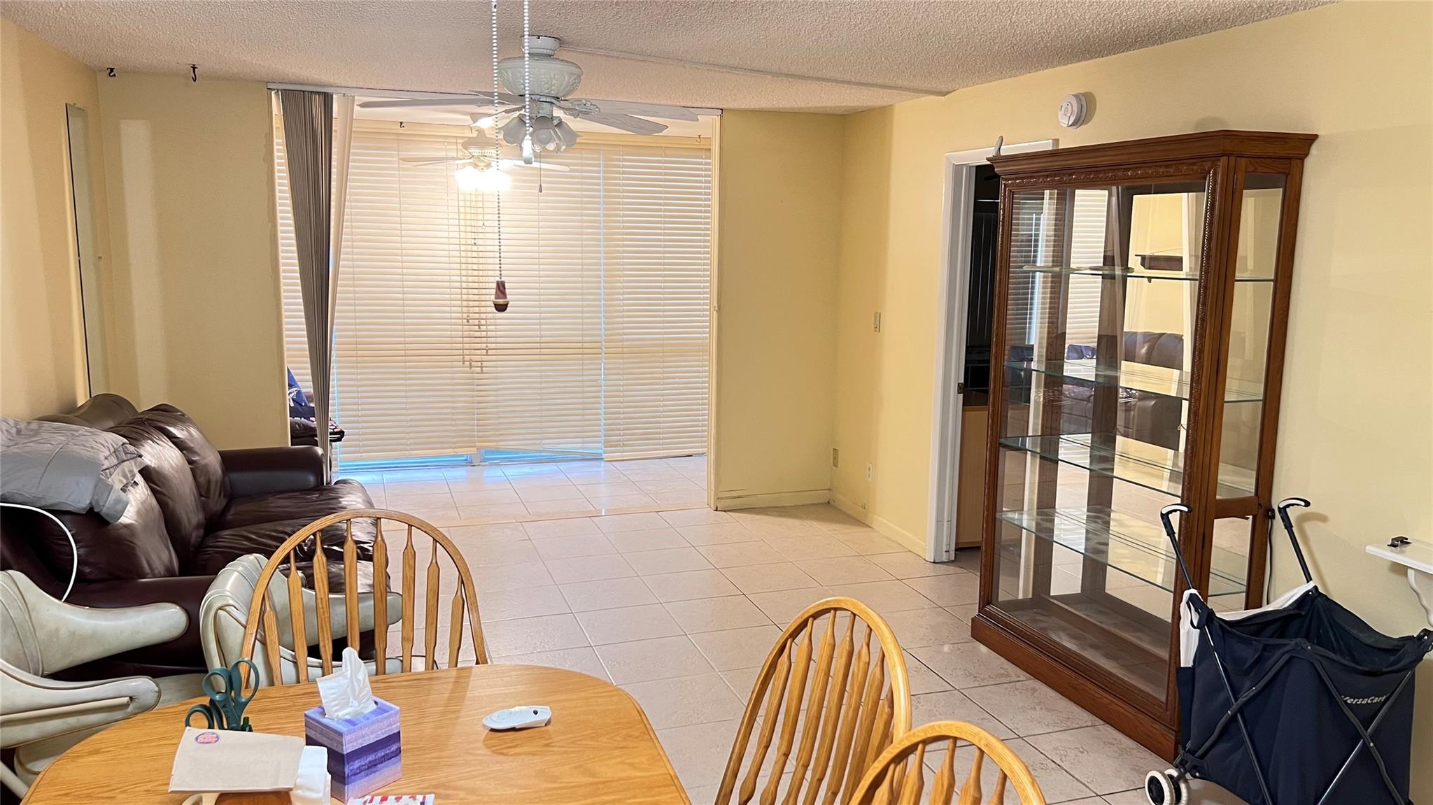 Golf, indoor and outdoor pools, tennis, movies and pickleball are only a few of the resort-style amenities for this corner unit 2 bed, 2 bath condo. Its spacious split bedroom layout offers ample storage and plenty of natural light. The kitchen was recently renovated and has modern cabinets and countertops and newer appliances. The 2nd floor location creates a lovely view of the lake from the back porch that has hurricane impact windows. AC is 2019. This 55+ active adult community is only 5 minutes to the Sawgrass Mills Mall and about 20 minutes to the beach and the airport and has a full fitness center, billiards, sauna, event space. and outdoor BBQ areas. Easy to show! Please see notes and HOA link for HOA requirements.