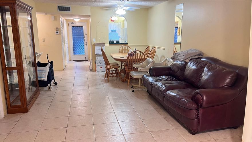 Golf, indoor and outdoor pools, tennis, movies and pickleball are only a few of the resort-style amenities for this corner unit 2 bed, 2 bath condo. Its spacious split bedroom layout offers ample storage and plenty of natural light.  The kitchen was recently renovated and has modern cabinets and countertops and newer appliances.  The 2nd floor location creates a lovely view of the lake from the back porch that has hurricane impact windows.  AC is 2019.  This 55+ active adult community is only 5 minutes to the Sawgrass Mills Mall and about 20 minutes to the beach and the airport and has a full fitness center, billiards, sauna, event space. and outdoor BBQ areas.  Easy to show! Please see notes and HOA link requirements. Seller is motivated and will pay up to $2,000 of buyer's closing costs.