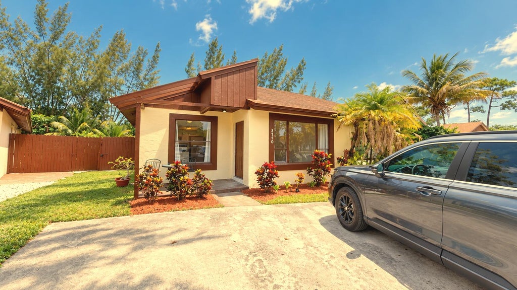 Photo of 3770 MIL LAKE Court, Greenacres, FL 33463 (MLS # B26083675)