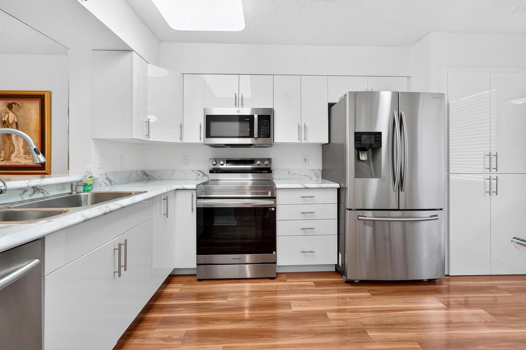 Photo of 6065 Pointe Regal Circle #407, Delray Beach, FL 33484 (MLS # R11127984)