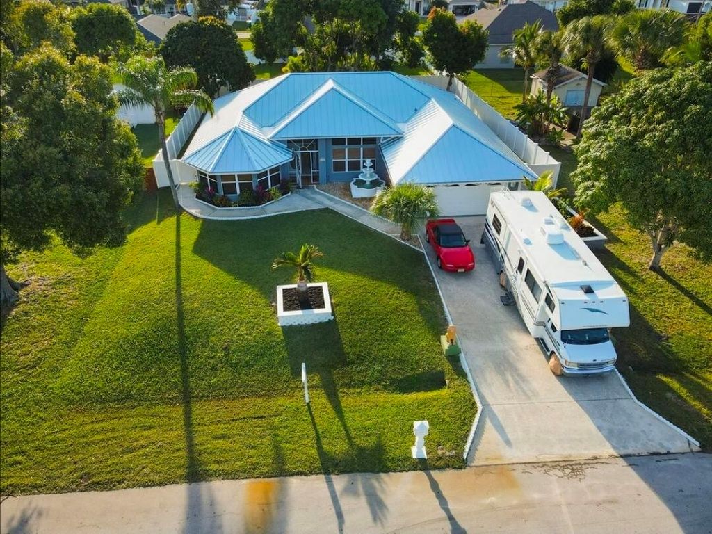 Photo of 3852 SW Ramspeck Street, Port Saint Lucie, FL 34953 (MLS # R11140888)