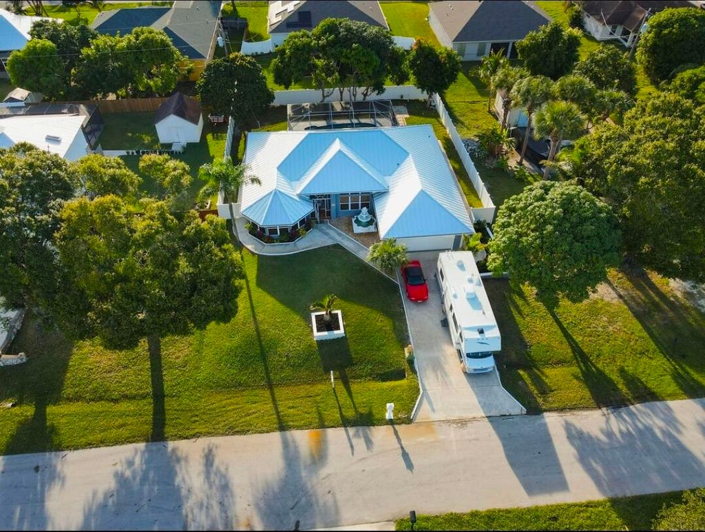 Photo of 3852 SW Ramspeck Street, Port Saint Lucie, FL 34953 (MLS # R11140888)