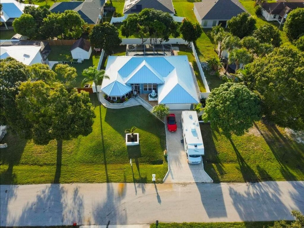 Photo of 3852 SW Ramspeck Street, Port Saint Lucie, FL 34953 (MLS # R11140888)