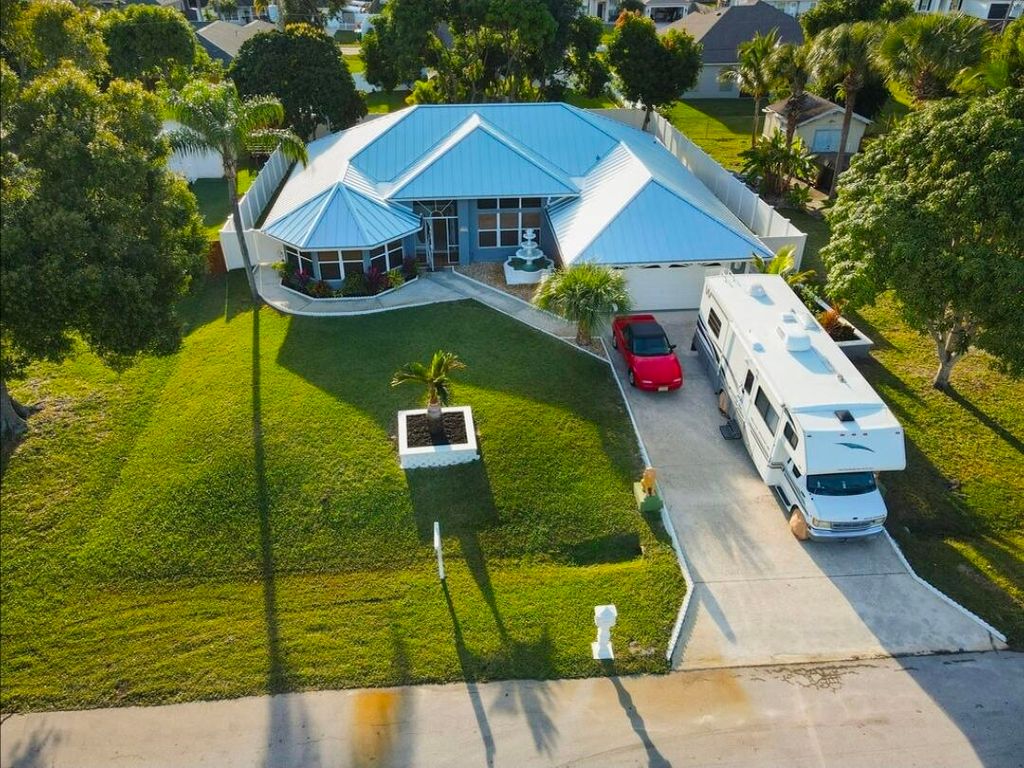 Photo of 3852 SW Ramspeck Street, Port Saint Lucie, FL 34953 (MLS # R11140888)