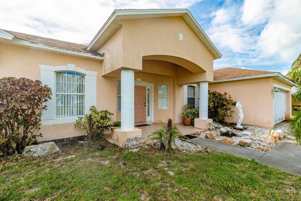Photo of 2343 SW Mountwell Street, Port Saint Lucie, FL 34984 (MLS # R11013577)