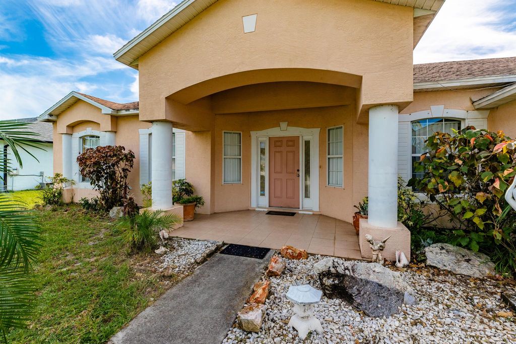 Photo of 2343 SW Mountwell Street, Port Saint Lucie, FL 34984 (MLS # R11013577)