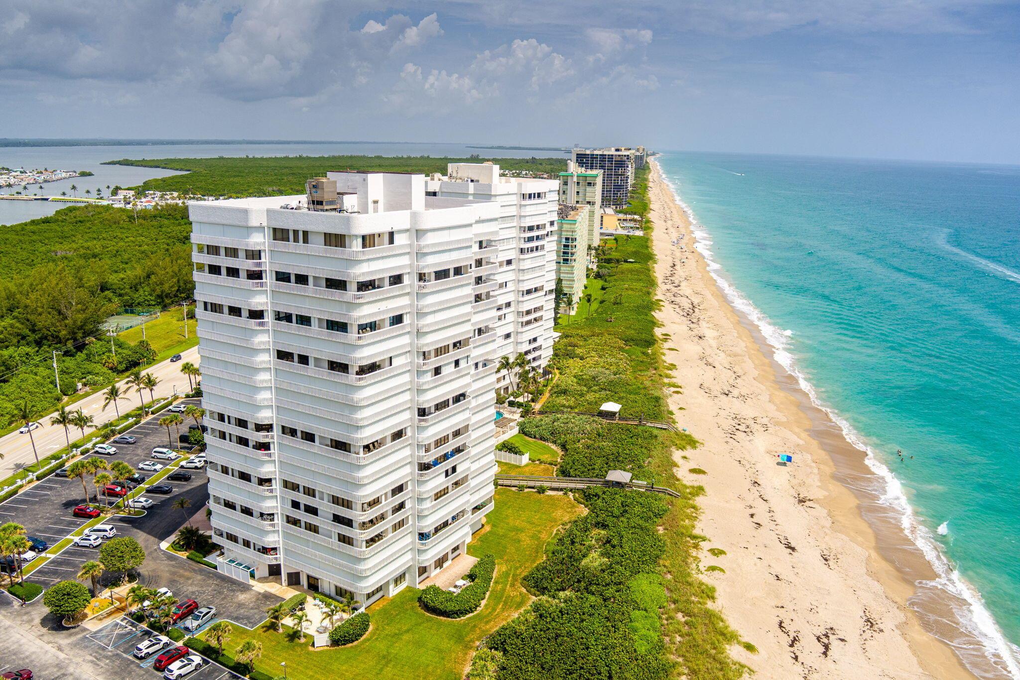 Ocean Front Condo on Hutchinson Island, in Jensen Beach! Breathtaking ocean to river views from your balcony! This Two Bedroom, Two bath, features over 1,700 Sq Ft, Tile flooring throughout the living area with updated laminate in the bedrooms. Step out of your condo and onto the pristine sands of Hutchinson Islands' beautiful beach. The perfect beach for surfing, sunbathing or those evening walks or morning sunrises. Florida living at its best! Miramar II is a meticulously maintained building w/ Social and Card rooms, fitness center, large heated pool, tennis court, that serves this 90 unit building. Gated secured parking and lobby entry. Only 5 units per floor, and no catwalks. Private lobby with two Elevators. In house condo management. Perfect location just minutes to downtown,