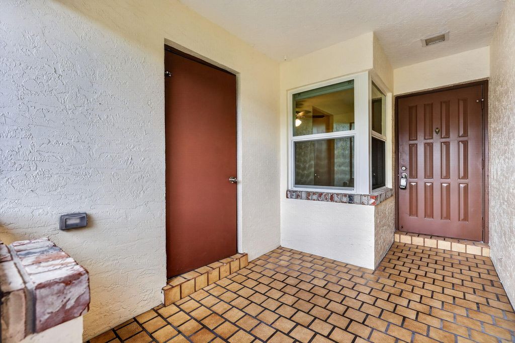 Photo of 140 S Moccasin Trl Trail S, Jupiter, FL 33458 (MLS # B26032698)