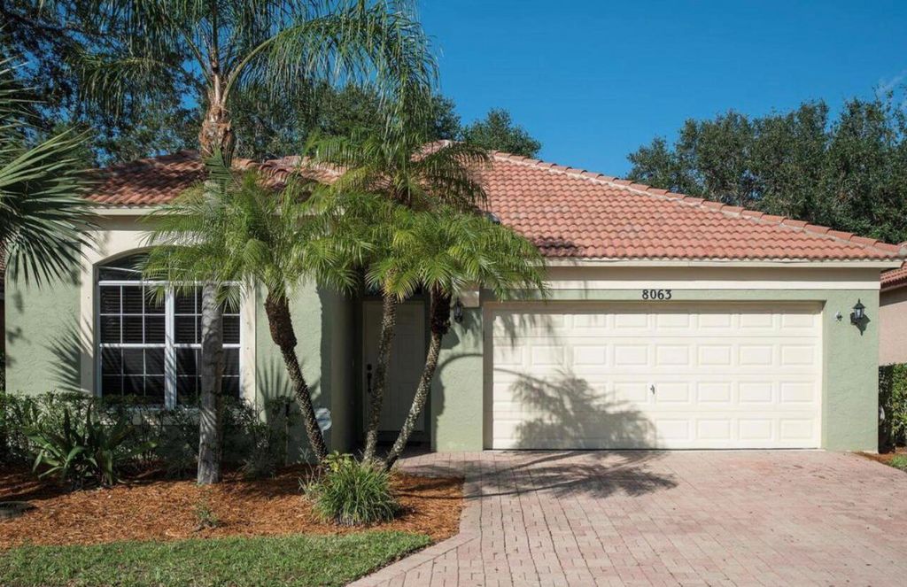 Photo of 8063 Via Hacienda, Riviera Beach, FL 33418 (MLS # R10932189)