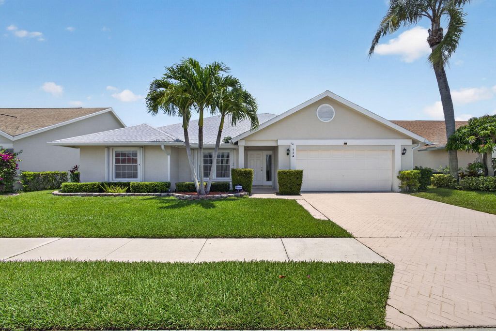 Photo of 114 Palomino Drive, Jupiter, FL 33458 (MLS # B26045199)