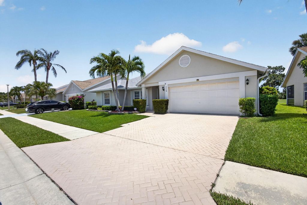 Photo of 114 Palomino Drive, Jupiter, FL 33458 (MLS # B26045199)