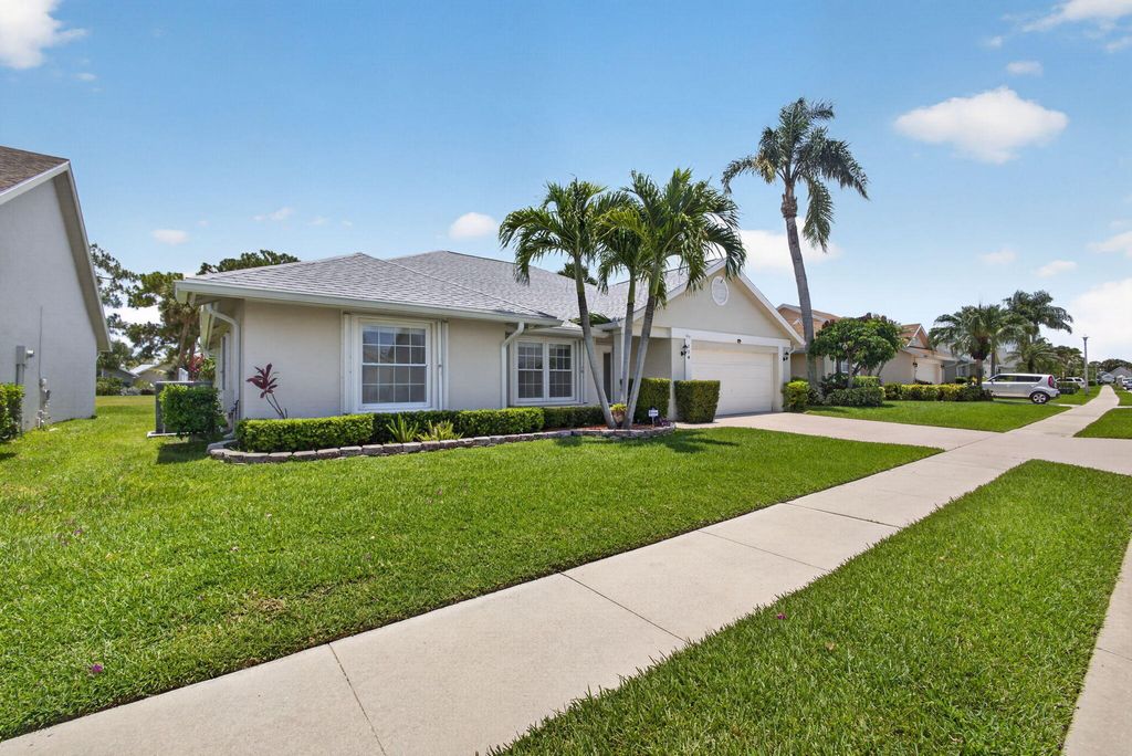 Photo of 114 Palomino Drive, Jupiter, FL 33458 (MLS # B26045199)