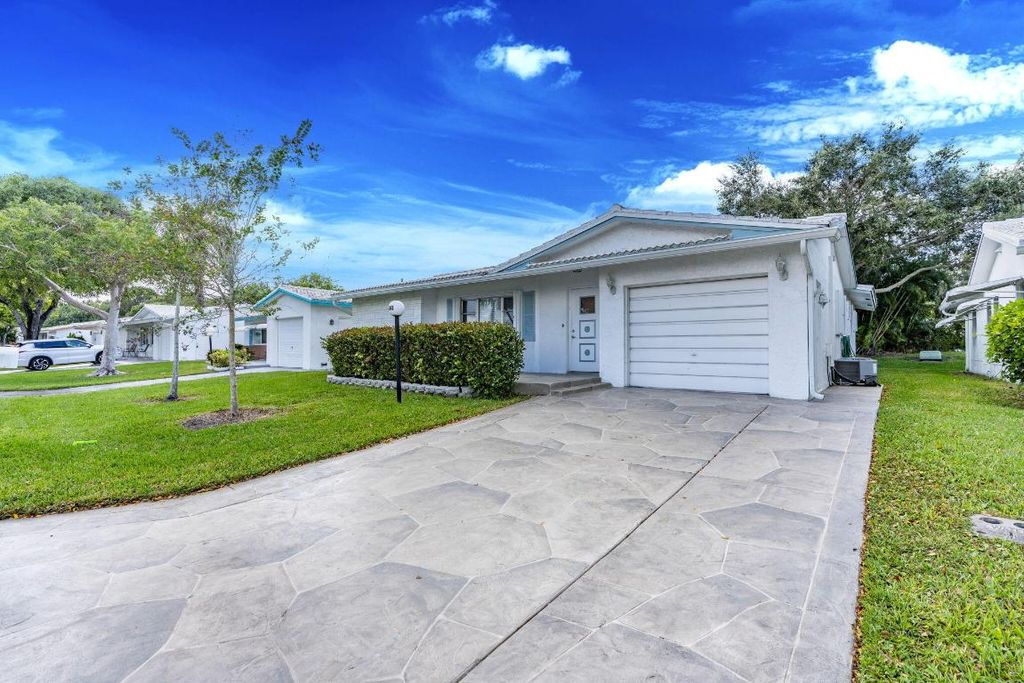 Photo of 1141 NW 90th Way, Plantation, FL 33322 (MLS # R11146592)