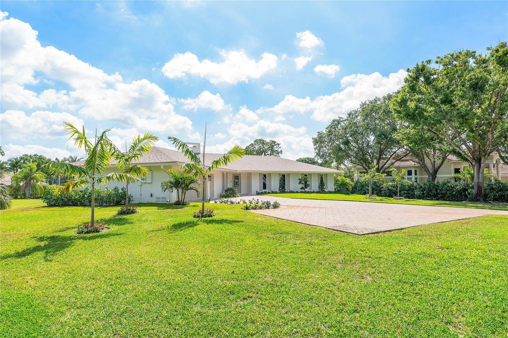 Photo of 6148 NW 74th Terrace, Parkland, FL 33067 (MLS # F10508354)