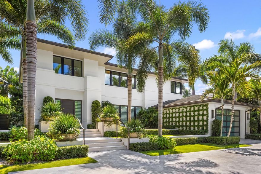 Gorgeous contemporary 4BR/5.1BA home built in 2020. Stunning marble and hardwood detailing. Formal foyer leads to living room and dining room. Beautiful kitchen with enormous chef's island, top-of-the-line appliances, and gorgeous detailing. Large Primary Suite features balcony and dual baths and closets. Additional highlights include elevator, wine storage, and 2 car garage. Tropical landscaping surrounding resort-style backyard with pool, BBQ, and loggia with fireplace.