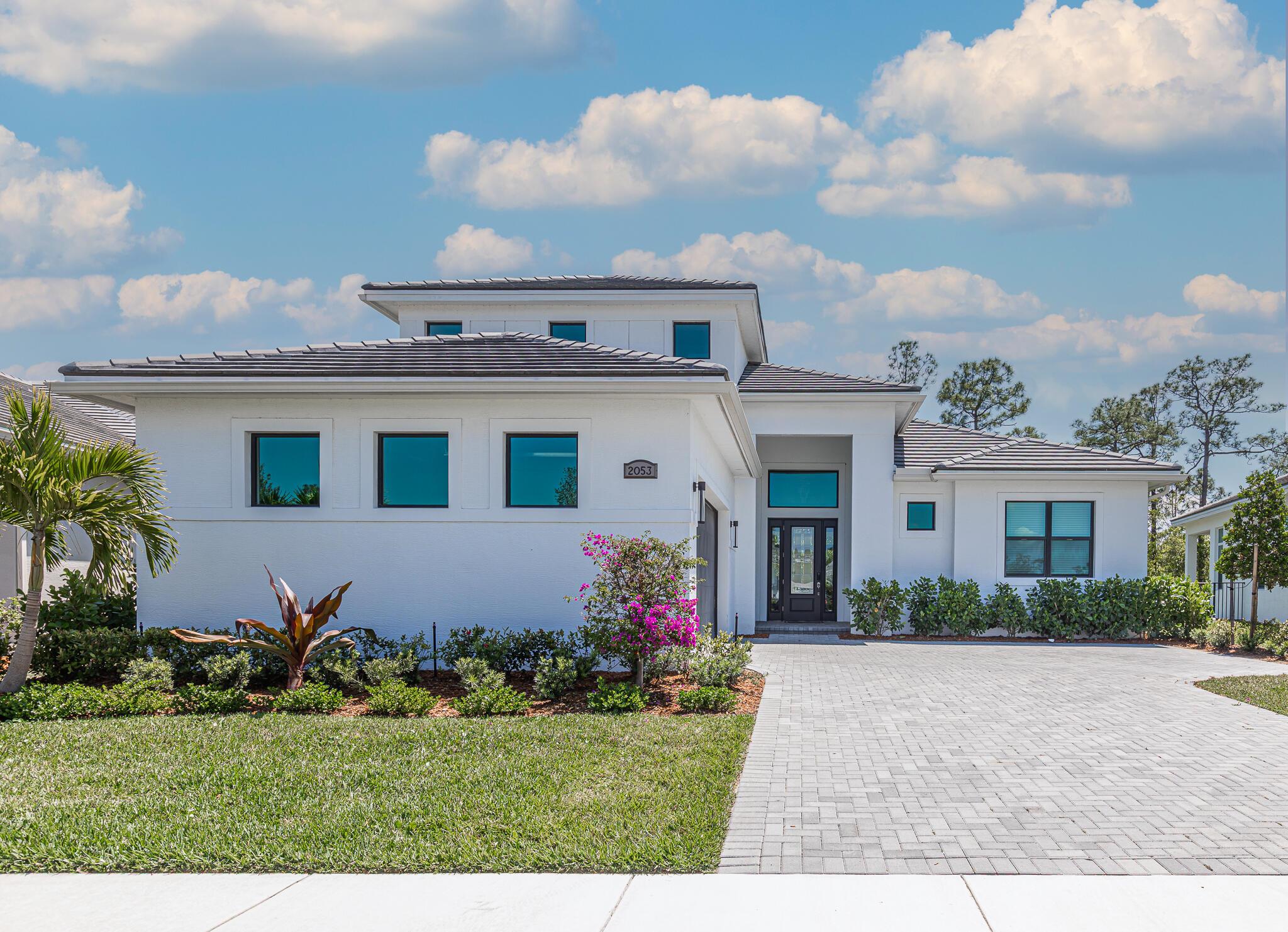 When you think of turnkey, this home comes to mind. A completely upgraded new build in the gated community of Mosaic. Designed by a professional designer, the craftsmanship speaks for itself throughout the home. Spend time in the custom kitchen, enjoy the fireplace, or cozy up in the theatre room, come make this home your own.The master suite, along with Bedroom 1 and Bedroom 2, all offer built-in beds, maximizing style. Need a guest room, an office, a playroom? A second floor was added to this model offering a unique loft area- complete with its own bathroom and closet.8 minutes from nearby Publix and restaurants25 minutes to beaches20 minutes to Tradition Village centerFurniture package available upon request.