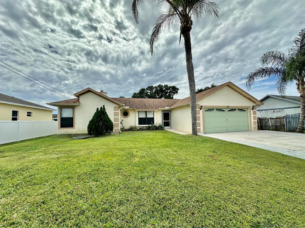 Photo of 262 SW Aubudon Avenue, Port Saint Lucie, FL 34984 (MLS # R10967880)