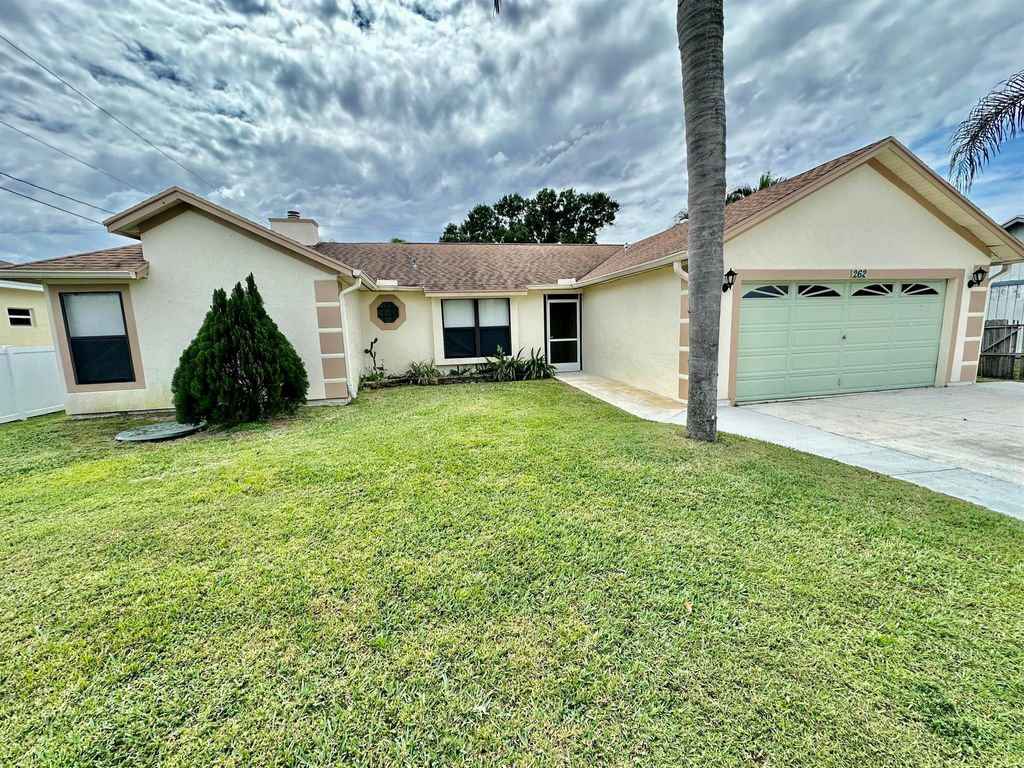 Photo of 262 SW Aubudon Avenue, Port Saint Lucie, FL 34984 (MLS # R10967880)