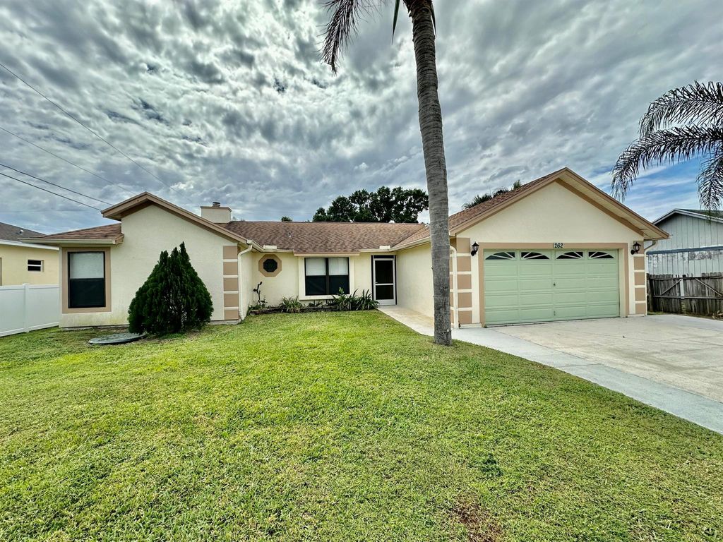 Photo of 262 SW Aubudon Avenue, Port Saint Lucie, FL 34984 (MLS # R10967880)