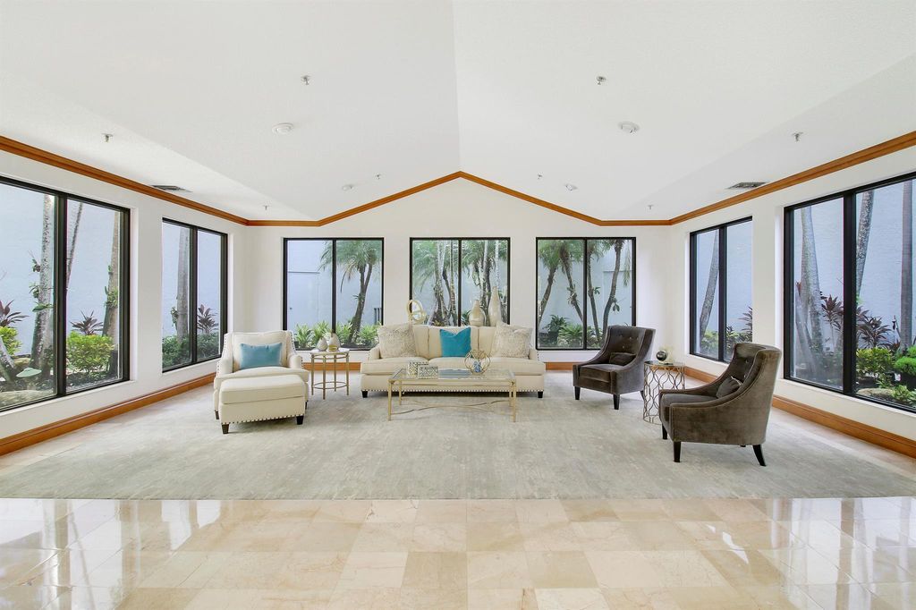 Photo of 7567 Imperial Drive #702, Boca Raton, FL 33433 (MLS # R11110074)