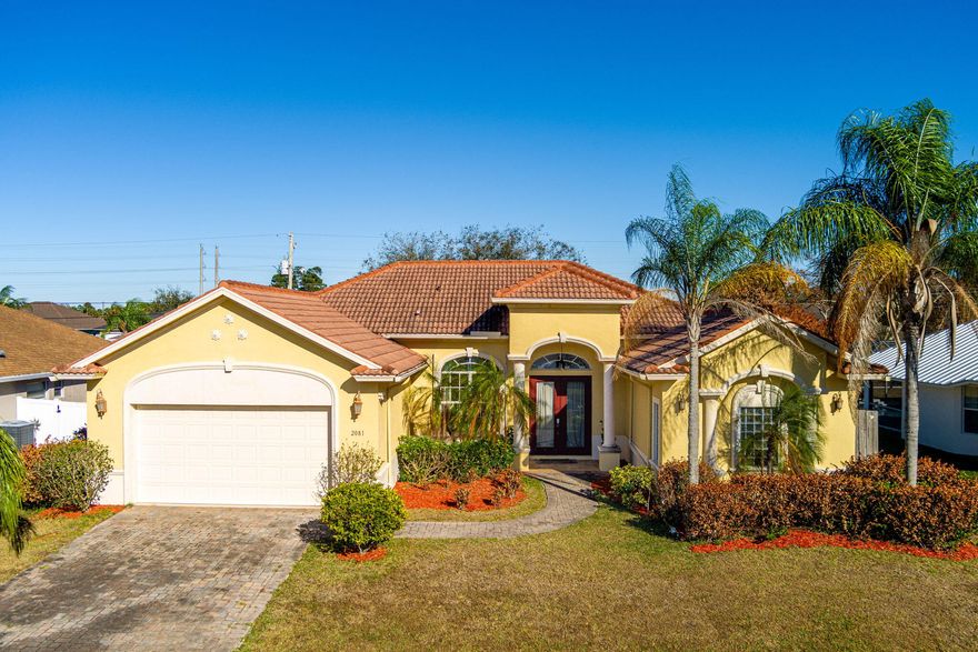 Welcome to this beautifully upgraded home located in the heart of Port St. Lucie! This move-in-ready property offers the perfect blend of modern upgrades, functional living space, and Florida lifestyle. Upgraded Chef inspired kitchen ideal for entertaining featuring quartz countertops, stainless steel appliances, sleek white cabinetry, a statement stainless steel range hood overtop a center island with built-in cooktop. Perfect for entertaining or everyday living. The open-concept layout flows seamlessly into the main living and dining areas, creating a bright and inviting atmosphere. Bathrooms have been tastefully upgraded.
The spacious backyard offers plenty of room for a pool, Close to I95 and the beach.