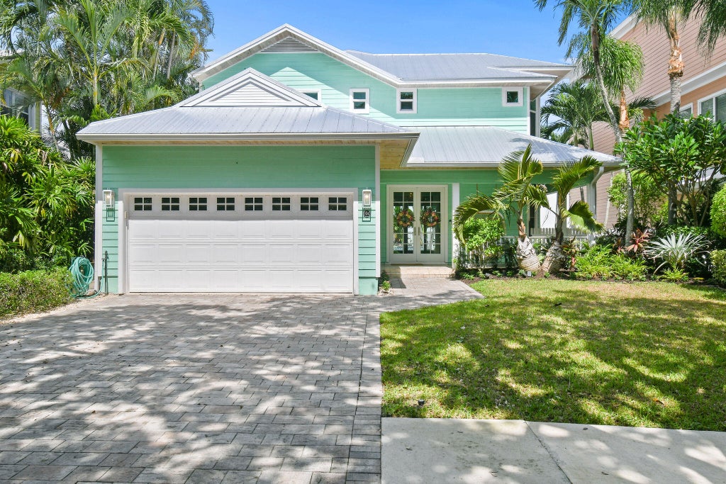Photo of 104 Intracoastal Circle, Tequesta, FL 33469 (MLS # B26088632)