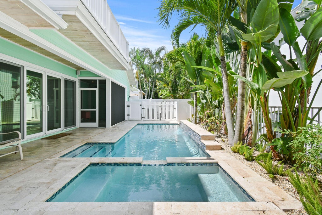 Photo of 104 Intracoastal Circle, Tequesta, FL 33469 (MLS # B26088632)