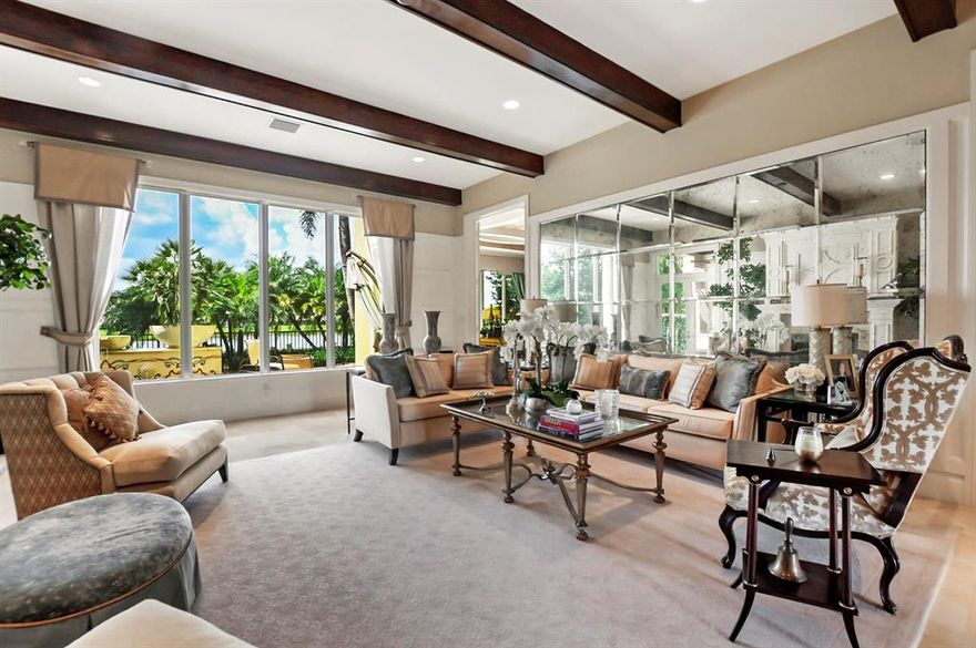 Located in the Heart of Boca Raton, this Lakefront Three-Story Mansion w/ Optimal Southern Exposure presents over 9500 sq. ft and features 4 Spacious Bedroom Suites, 5 full & 2 half baths, PLUS a State-of the -Art Movie Theatre w/ a 100-inch projection TV, a Billiard & Game Room w/ Full Bar, 820 Bottle Wine Tasting Room that is temperature controlled, Office, 5-Car Garage, Marble Baths, Elevator, Lutron Whole-Home Lighting System, Control4 Systems, Natural Gas, Impact Windows/Doors and Designer Finishes at every turn.  Embracing Long Water Views, the Outdoor Space boasts a Custom-Designed Pool accented w/ Water Features, a Putting Green, a Fire Pit & a Summer Kitchen.  Azura is a manned-gated community on 37 acres w/ Impressive Estates, a fabulous clubhouse, Gym, Tennis & Pool/Hot Tub.