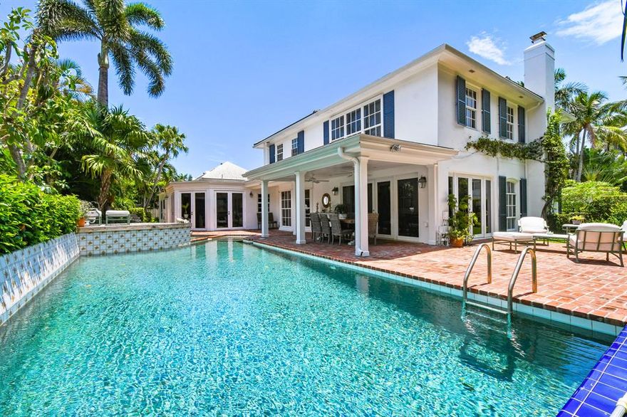 Located in town on prestigious Barton Avenue this elegant 4,590+/- total square foot residence offers 5 bedrooms, and 5 full baths.  Situated on an approximately 120' x 87' lot, the property has an array of wonderful outdoor spaces for both relaxing and entertaining. One can enjoy dining al fresco under the covered loggia or on the terrace, swimming in the pool, or finding calm in the spa.  The home's living room boasts a fireplace and large windows with views to the garden.  The sun room, filled with natural light, has a bar, and French doors that open to both the covered loggia and the terrace. The formal dining room has a bay window looking out to the tranquil pool with fountains.  The eat-in kitchen is appointed with a Viking gas range and oven, a Sub Zero refrigerator, wine fridge,