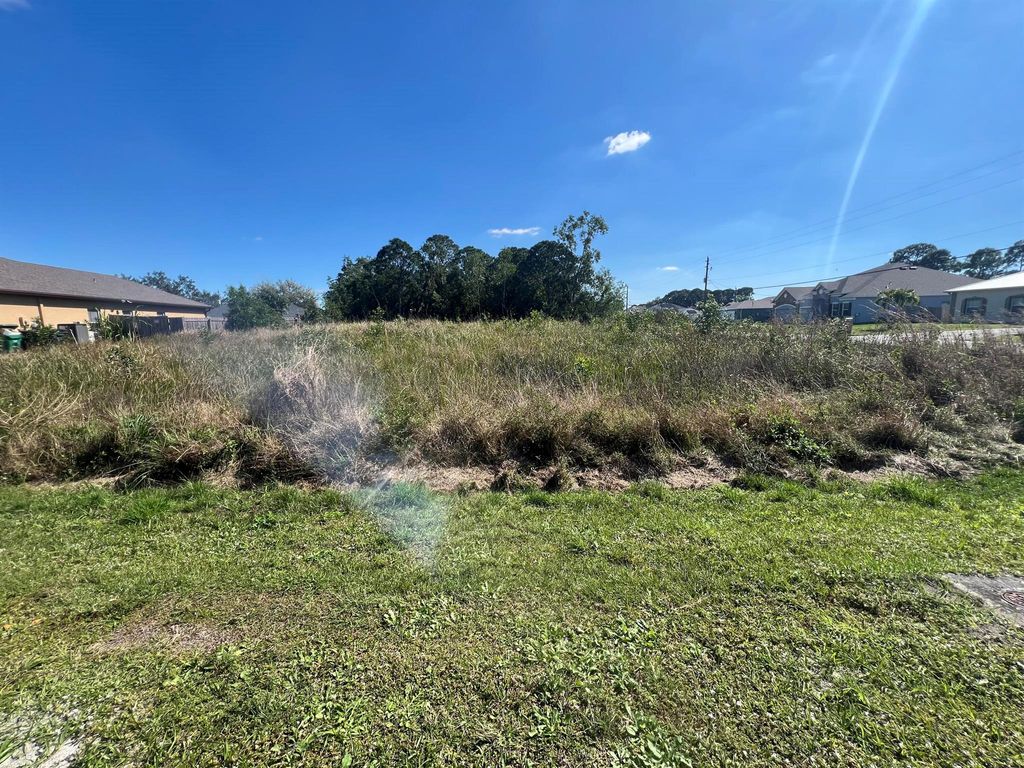 Photo of 6261 NW Topaz Way, Port Saint Lucie, FL 34986 (MLS # R10954637)