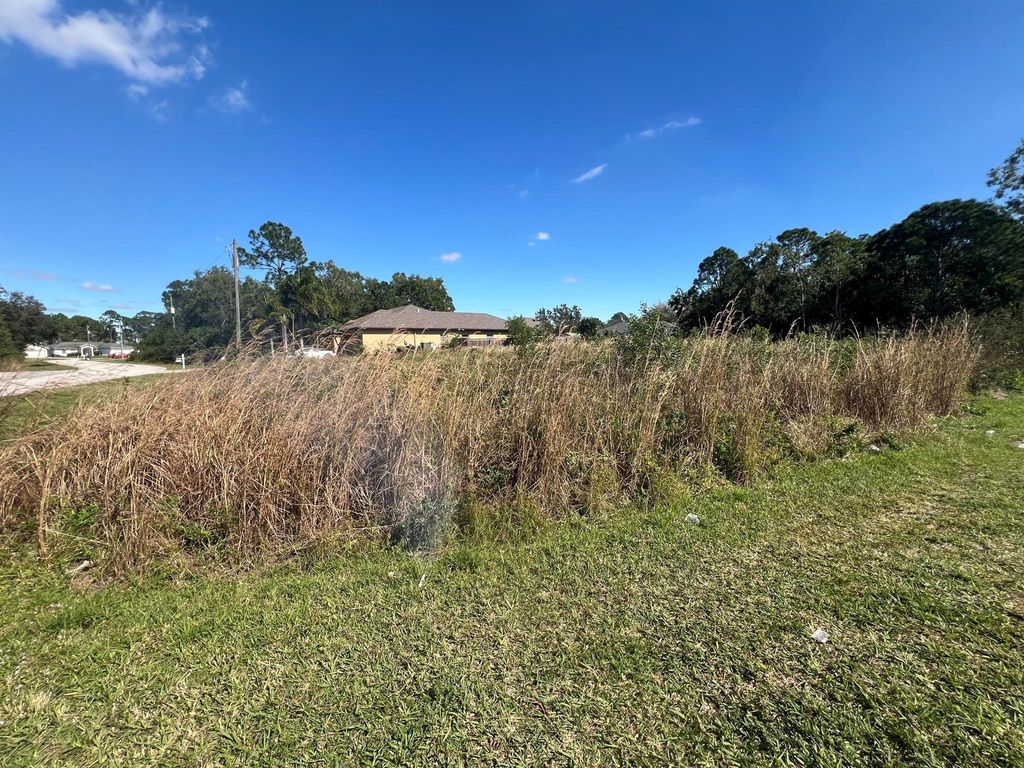 Photo of 6261 NW Topaz Way, Port Saint Lucie, FL 34986 (MLS # R10954637)