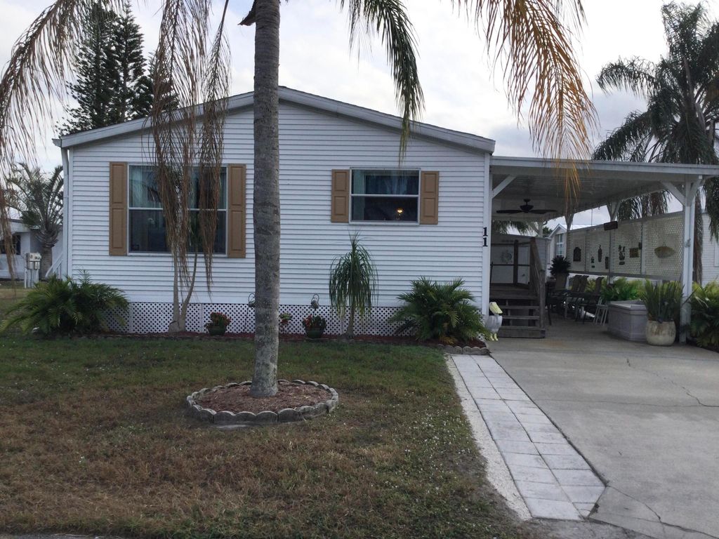 Photo of 11 SE Hidalgo Lane, Port Saint Lucie, FL 34952 (MLS # R11154113)