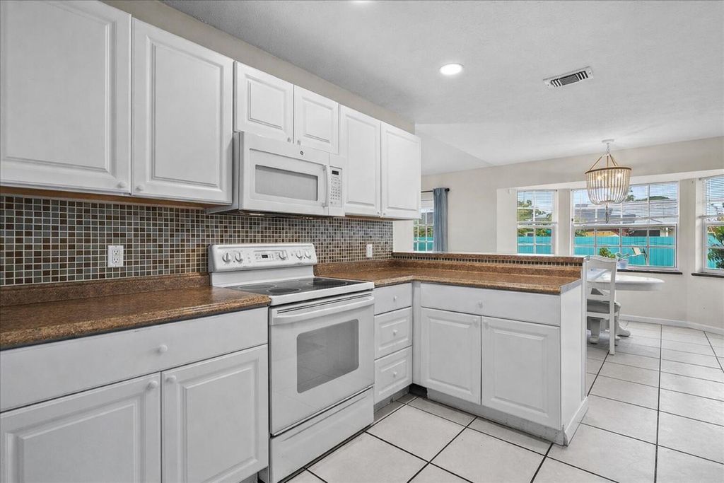 Photo of 2561 SE Jason Avenue, Port Saint Lucie, FL 34952 (MLS # R11160010)