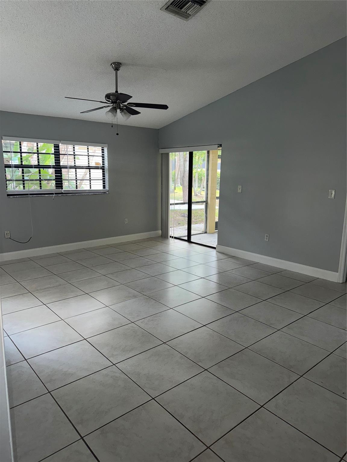 Large townhouse with two car garage!! Extra driveway parking as well! Kitchen, dining, large family room! This home offers screened in patio with sliding doors. Grassy backyard to play. Master is located downstairs with large closet and a full bathroom. Two additional rooms upstairs with full bath. This home is a great layout with split floorplan. Newly painted and epoxy garage floor. Full size washer and dryer. No HOA, FAST APPROVAL. Available now!