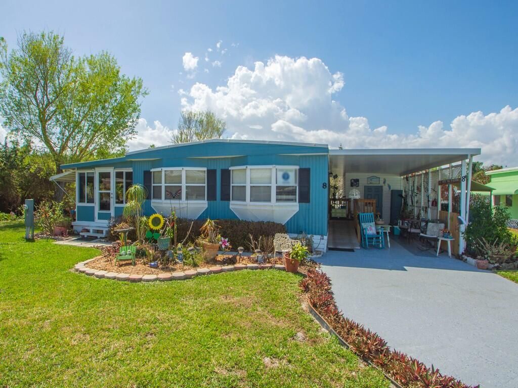 Photo of 8 Santa Fe Ln, Port Saint Lucie, FL 34952 (MLS # B26000437)