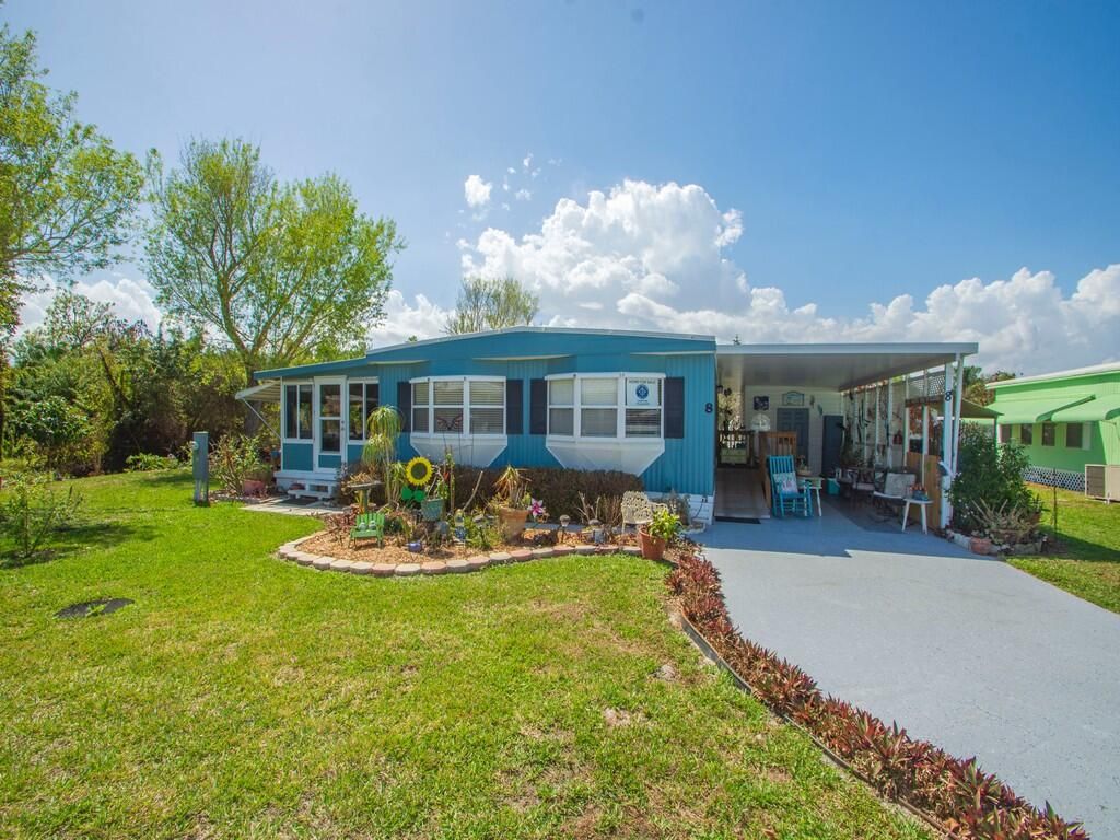 Photo of 8 Santa Fe Ln, Port Saint Lucie, FL 34952 (MLS # B26000437)