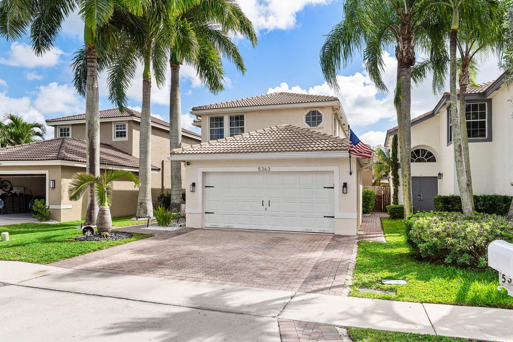 Photo of 5363 NW 117th Avenue, Coral Springs, FL 33076 (MLS # B26094656)
