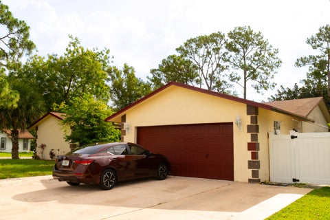 Photo of 5122 Ouachita Drive, Lake Worth, FL 33467 (MLS # B26035100)