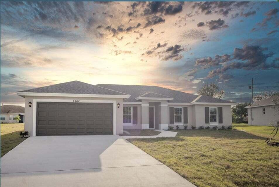 PRICE IMPROVEMENT!! Move-in ready! The spectacular Ibis model by award-winning Synergy Homes offers superior construction with impact-resistant windows and energy-efficient spray foam insulation. The stylish interior features granite countertops, stainless steel appliances, and tile flooring throughout the living areas. Enjoy Florida living on the spacious covered patio, perfect for entertaining! Conveniently located near major highways, including the FL Turnpike & I-95, this home is just minutes from the vibrant Tradition community, shopping, dining, Cleveland Clinic, and top-rated schools. Parks, golf courses, and the St. Lucie River are also nearby for outdoor enthusiasts. Experience the perfect blend of quality, comfort, and convenience in this brand-new home ready now.