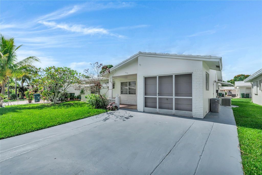 Photo of 7106 NW 72nd St, Tamarac, FL 33321 (MLS # F10518387)