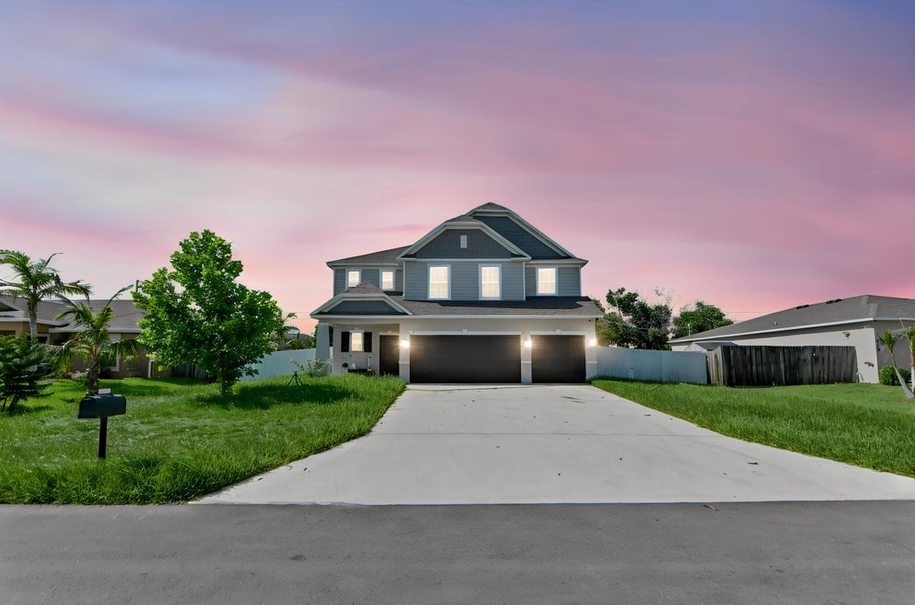Photo of 412 SW Dailey Avenue, Port Saint Lucie, FL 34953 (MLS # B26069684)
