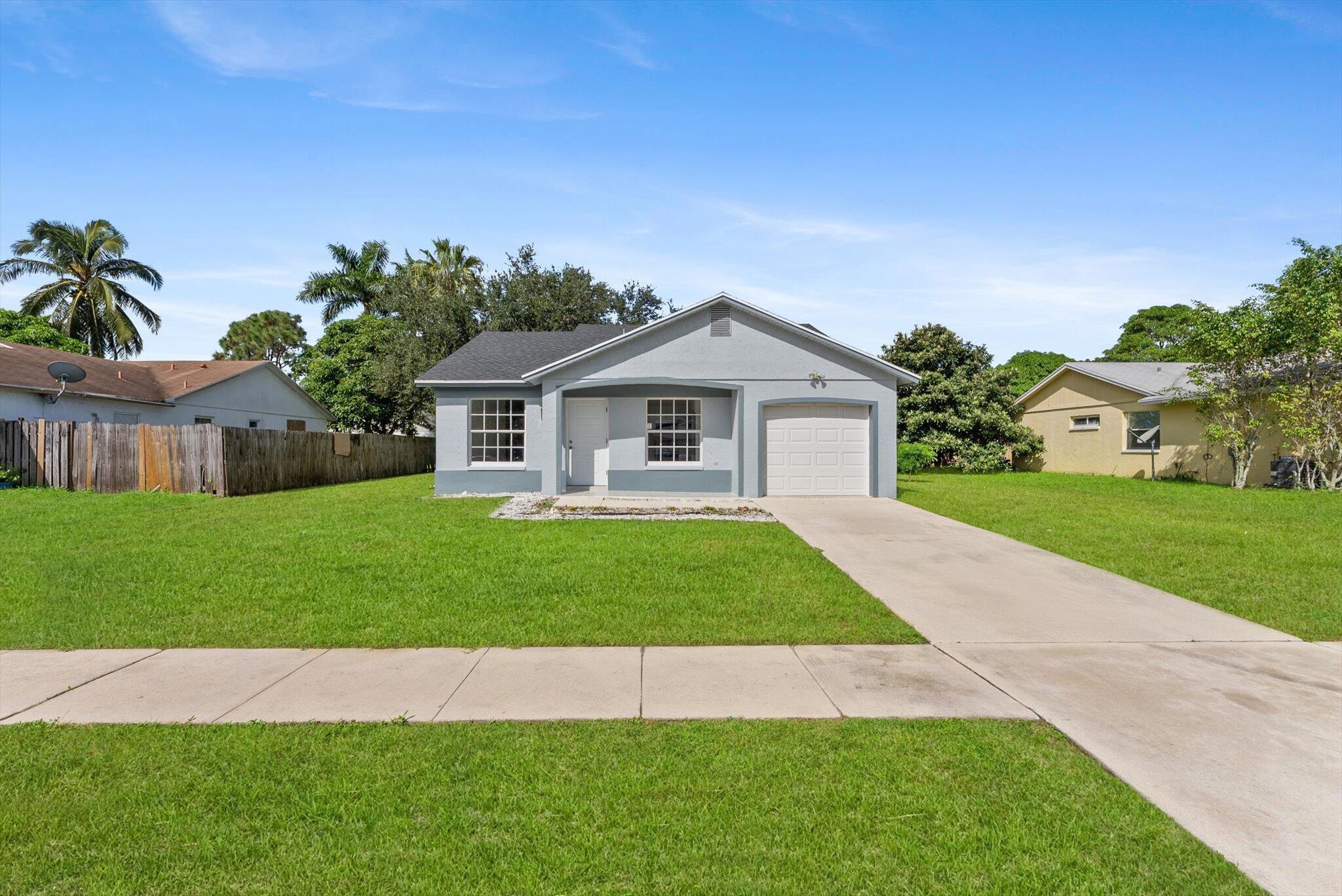 Fully Renovated 3/2 in Royal Palm Beach - No HOA!Move-in ready and beautifully updated! This 3-bedroom, 2-bath home features a brand new roof (Sept 2025), new AC, new water heater, and new appliances. Enjoy epoxy-coated garage floors, modern finishes, and a spacious lot -- all with no HOA restrictions. Prime location in the heart of Royal Palm Beach.Don't miss this one!