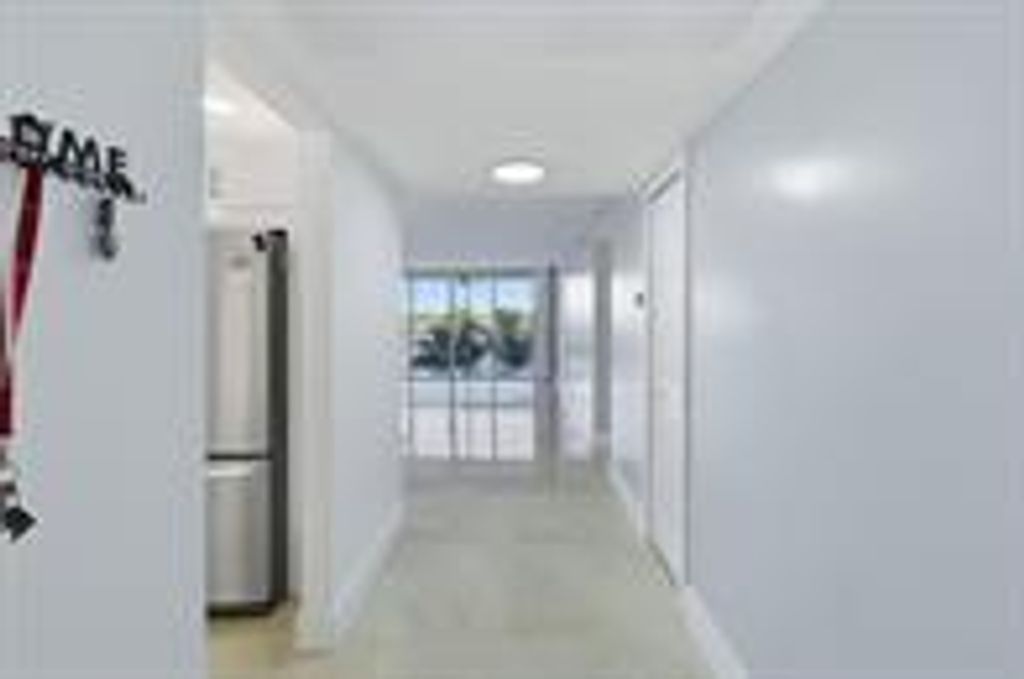 Photo of 3051 N Course Drive #309, Pompano Beach, FL 33069 (MLS # B26008385)