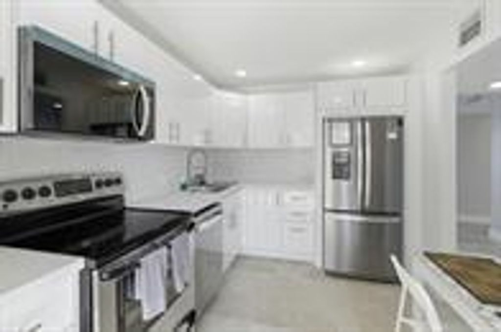 Photo of 3051 N Course Drive #309, Pompano Beach, FL 33069 (MLS # B26008385)